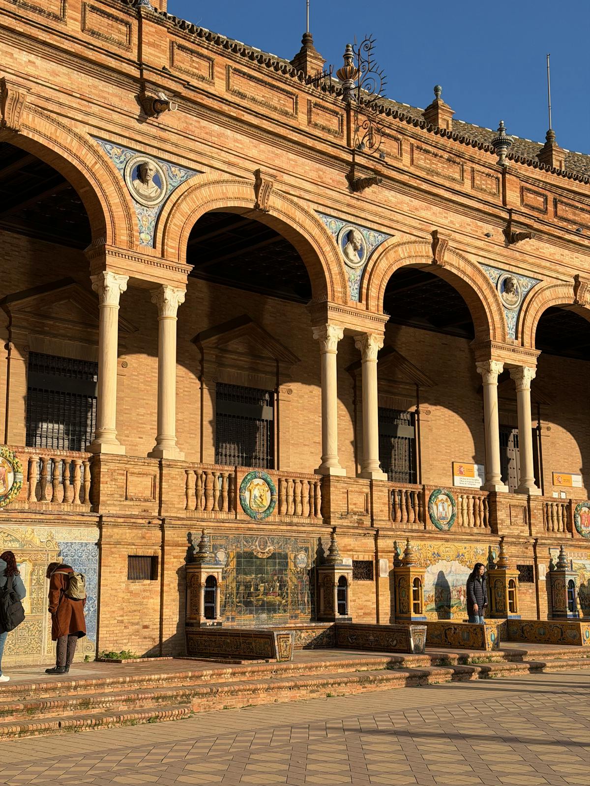 90 days in Spain - Plaza de Espana arched corridor in Seville for American expats
