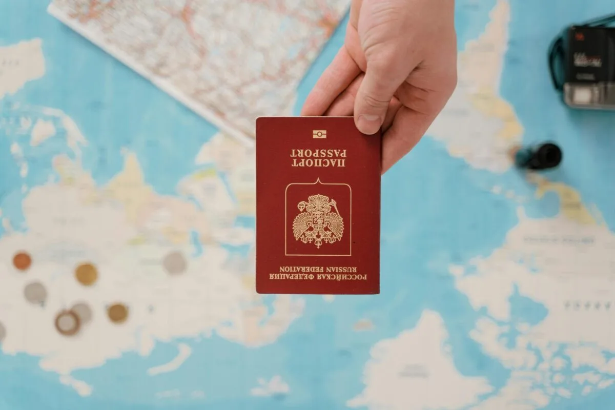 Digital Nomad Visas for Americans: The Complete Country-by-Country Guide (2026) 1 Digital nomad visas for Americans - passport held above a world travel map representing visa options abroad