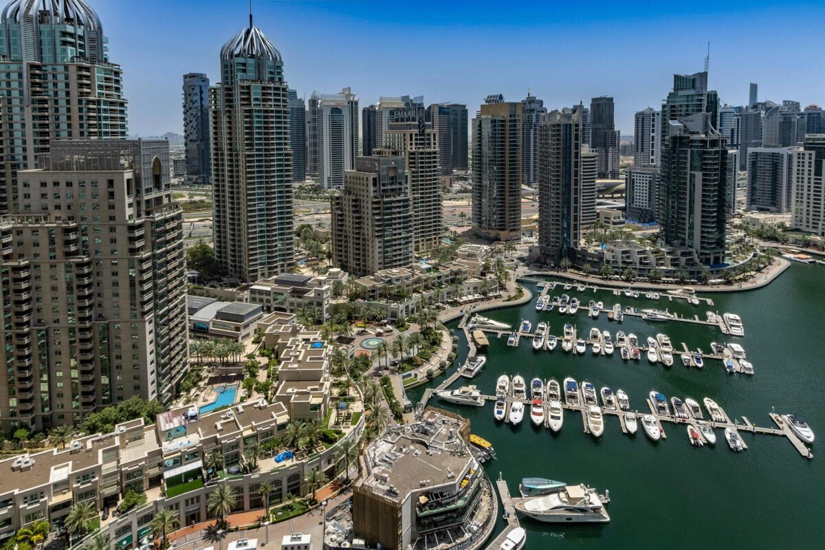 Moving to Dubai as an American - aerial view of Dubai Marina with modern skyscrapers and waterfront living
