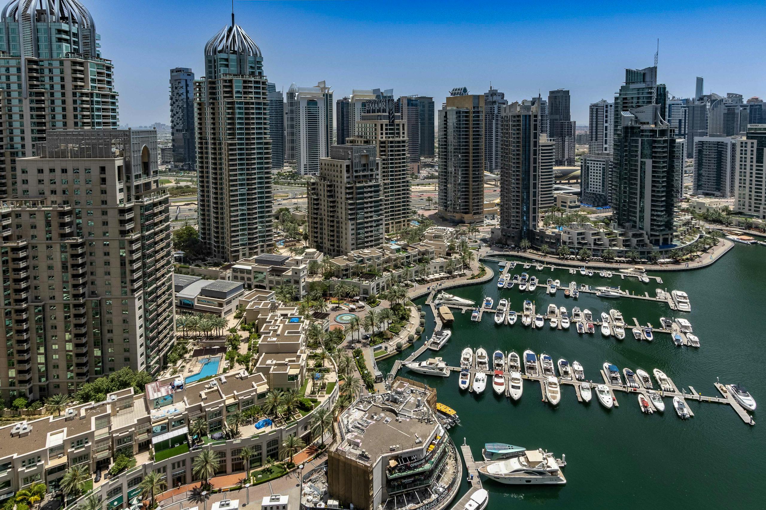 Moving to Dubai as an American - aerial view of Dubai Marina with modern skyscrapers and waterfront