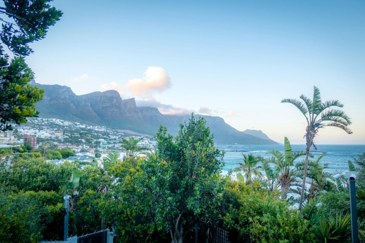 Moving to South Africa as an American: The Complete 2026 Guide 1 Moving to South Africa as an American - breathtaking view of Cape Town coastline with lush greenery and mountains