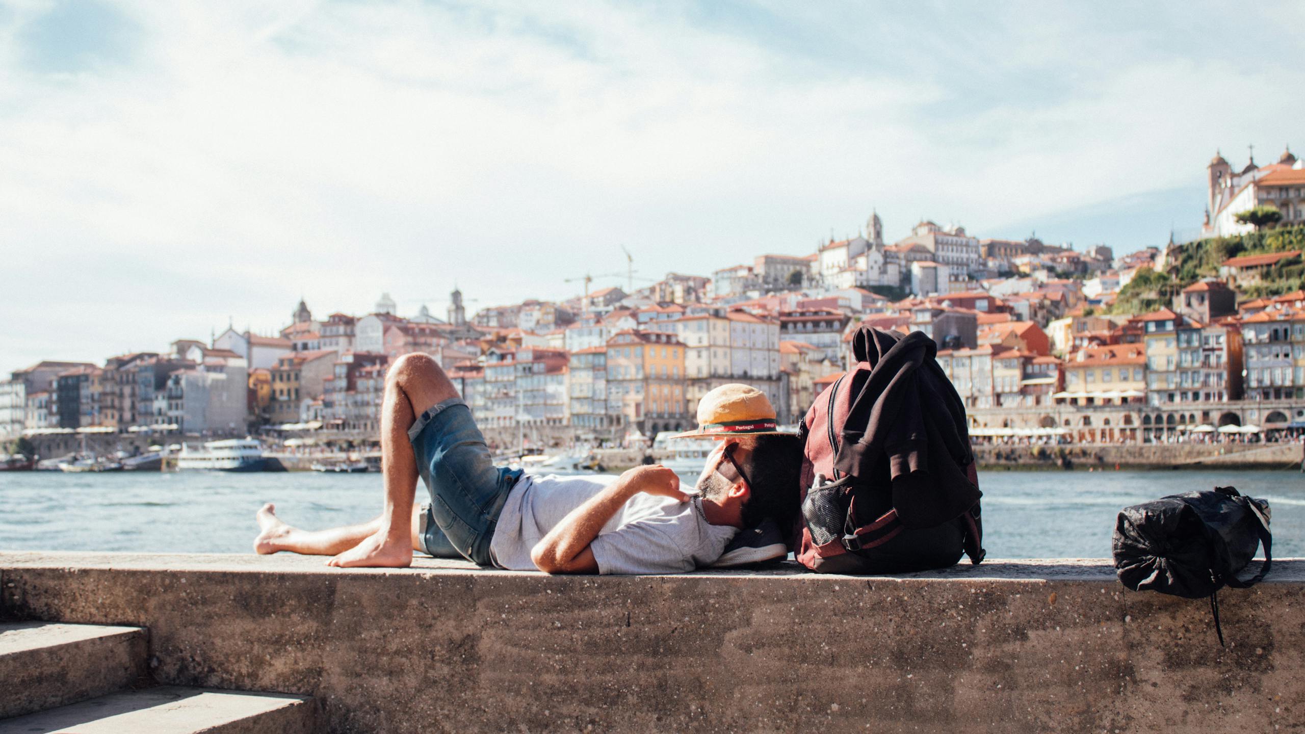 Portugal Digital Nomad Visa Apply: Your Easy Guide to Living and Working Remotely 3 Expat enjoying waterfront in Porto Portugal - digital nomad visa application