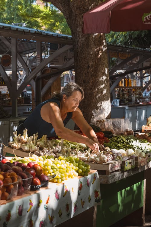 Woman at fresh produce market stall in Croatia