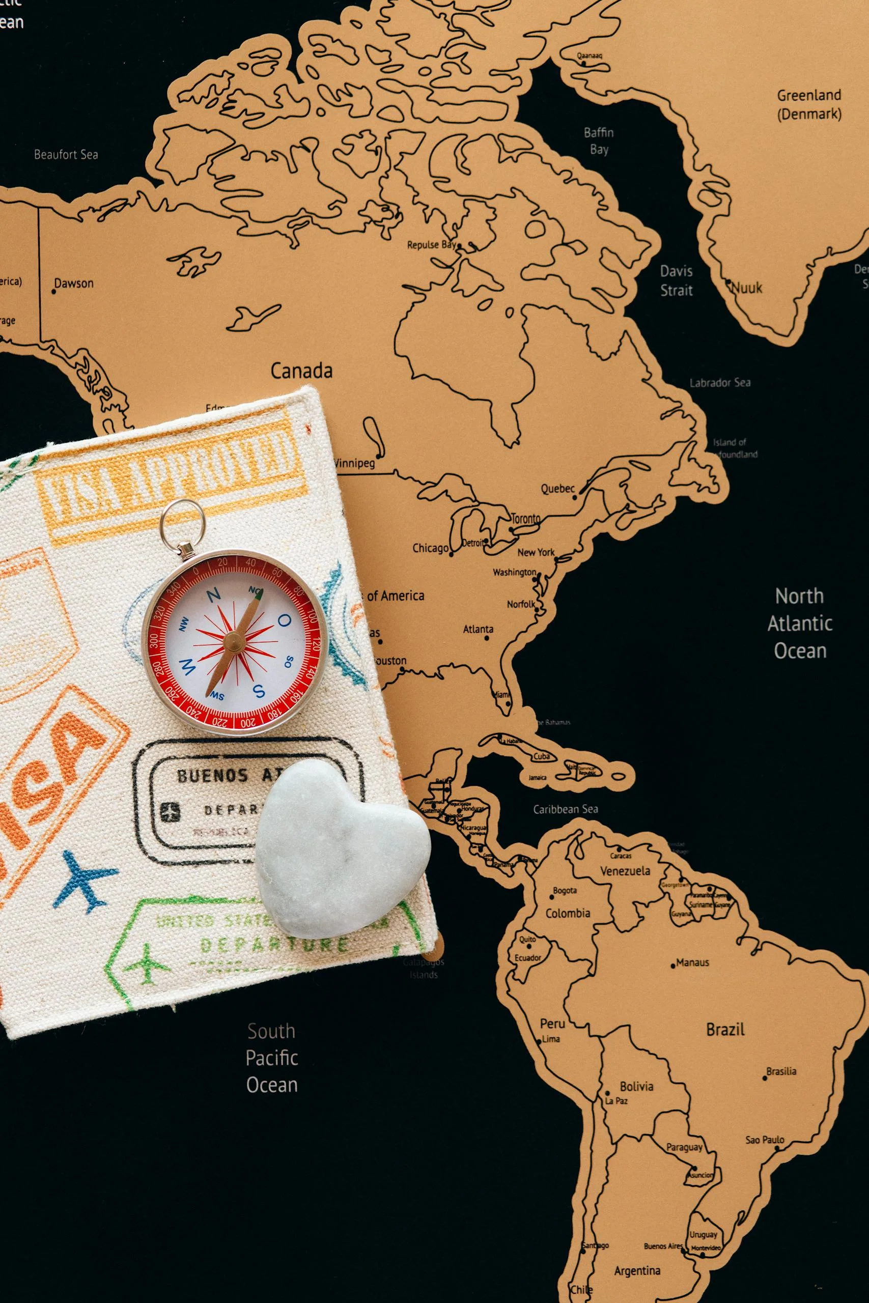 Best countries for Americans to move abroad, world map with passport and compass