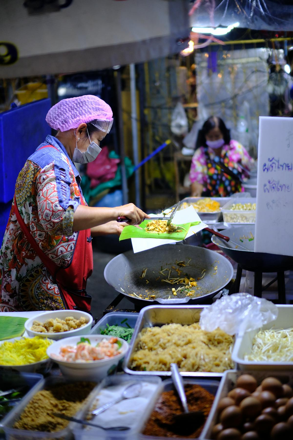 Street food vendor illustrating how you live in Thailand on $2,000