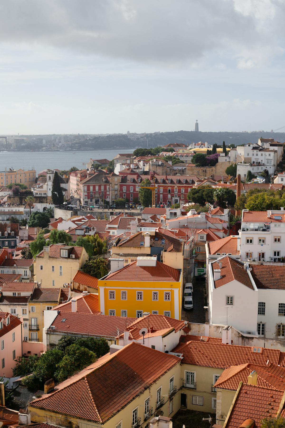 Lisbon historic rooftops view Portugal NHR tax regime for Americans guide