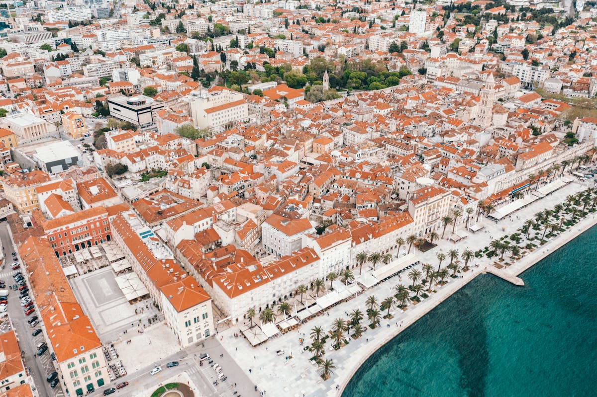 Aerial view of Split Croatia old town with red rooftops and Adriatic Sea - Croatia digital nomad visa destination