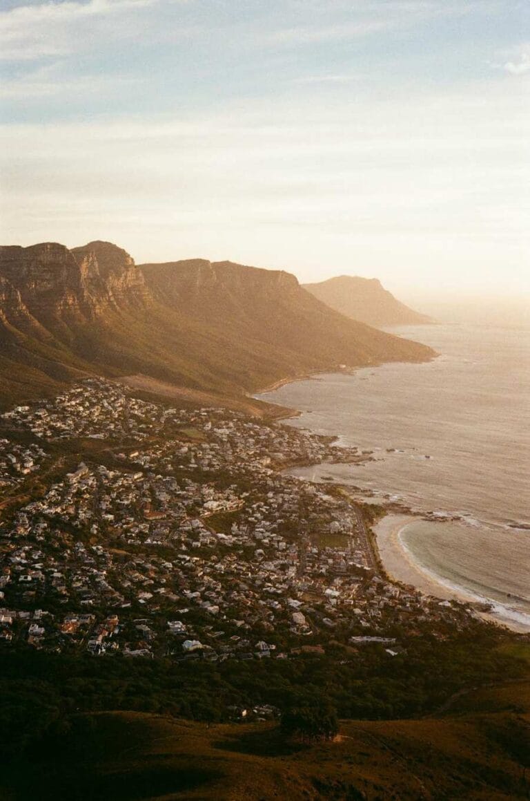 Aerial view of Cape Town South Africa with Table Mountain and coastal landscape at sunset