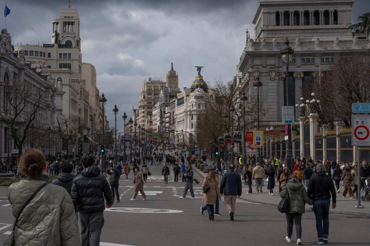 Madrid Gran Via busy street scene - cost of living in Spain for American expats