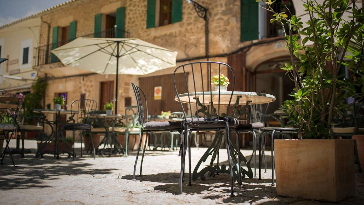 Outdoor cafe terrace in Mallorca Spain - Spanish lifestyle and culture for American expats