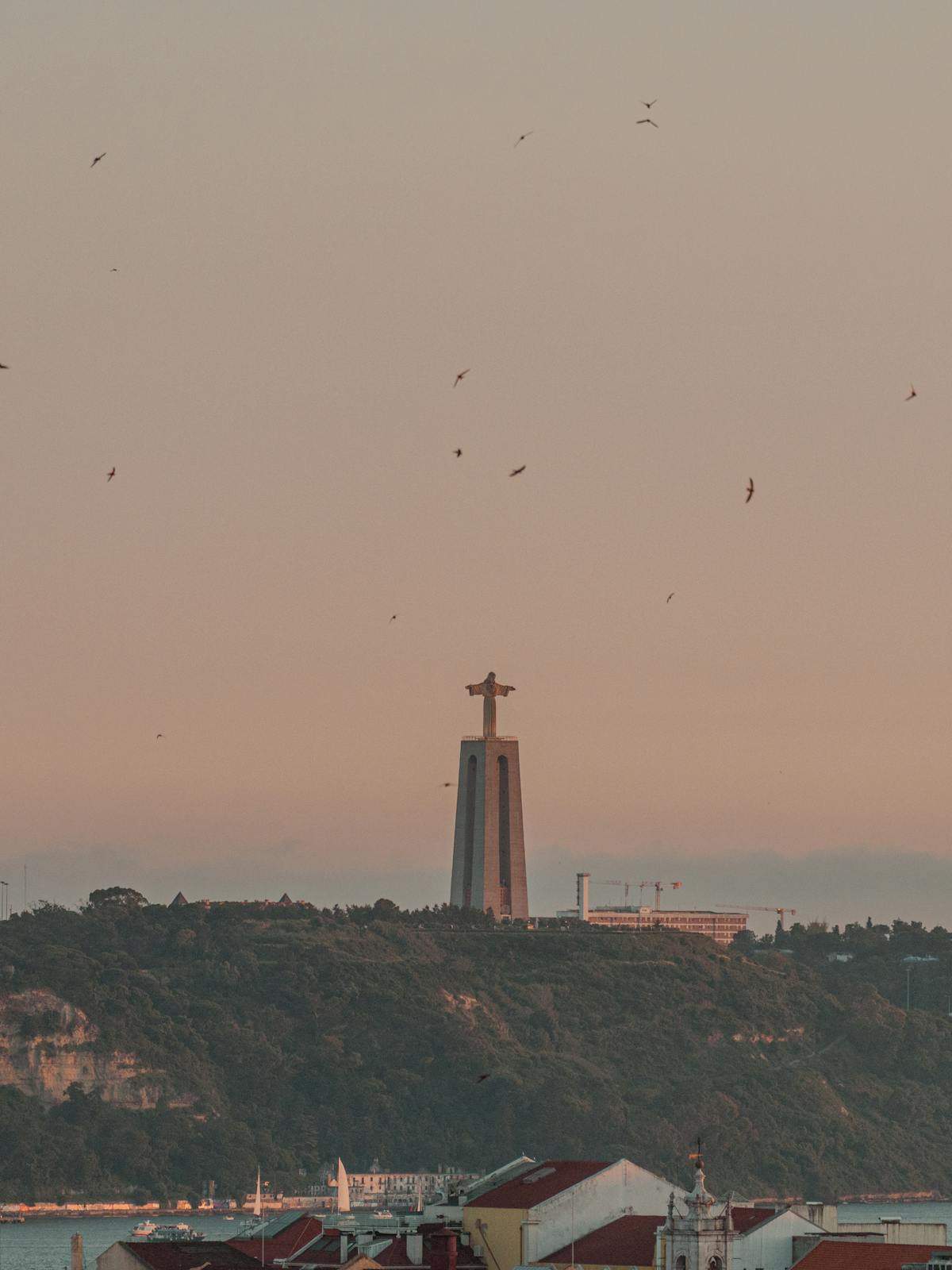 Portugal Digital Nomad Visa (D8): 2026 Requirements + How to Apply 1 Portugal digital nomad visa - Christ the King statue over Lisbon rooftops
