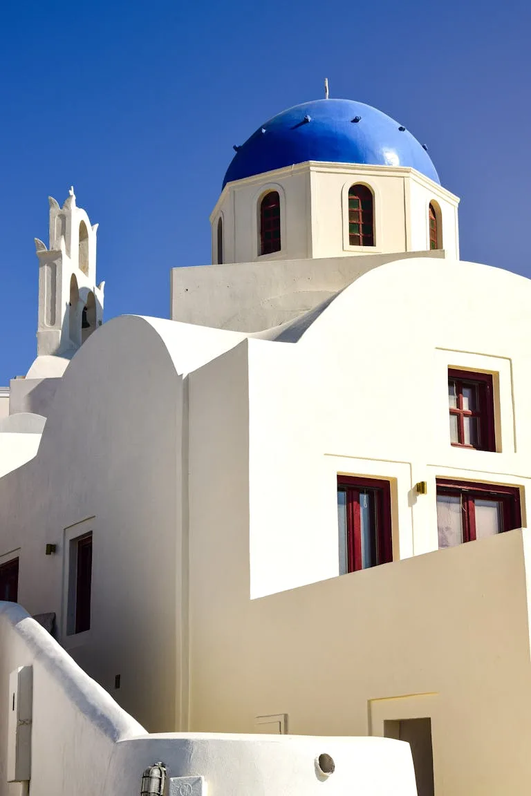 Santorini Greece white church with blue dome for Greece Digital Nomad Visa guide