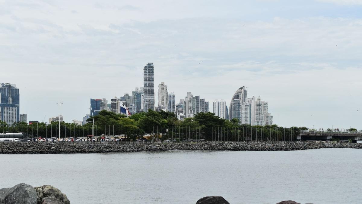 Cheapest Countries to Retire Abroad for Americans (2026) 4 Panama City skyline seen across the water from the waterfront, a retiree city on this list of the cheapest countries to retire