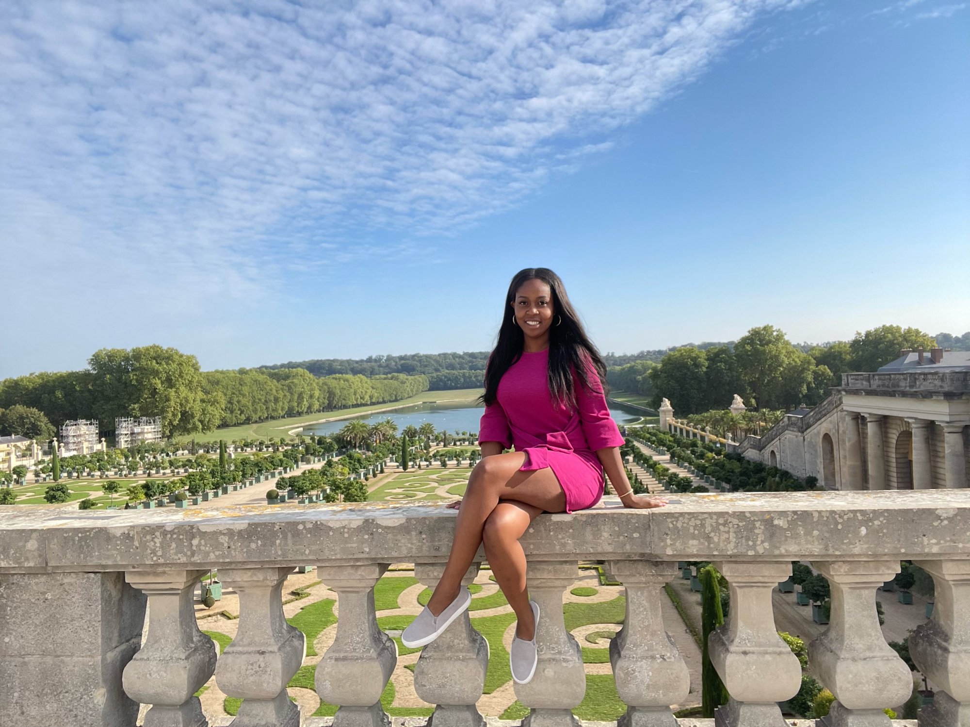 Kimberly, founder of MoveAbroadToolkit, at the Palace of Versailles in France during her extended stay abroad